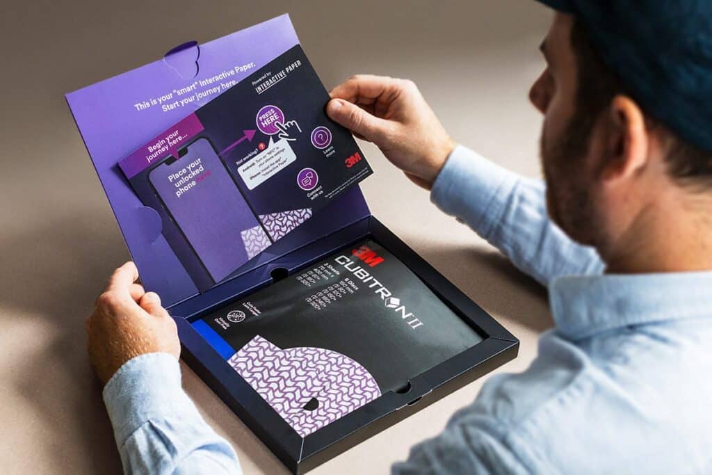 A man opening a premium box